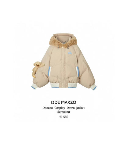 Beige cosplay down jacket with teddy bear design on a white background, featuring the brand '13DE MARZO'.