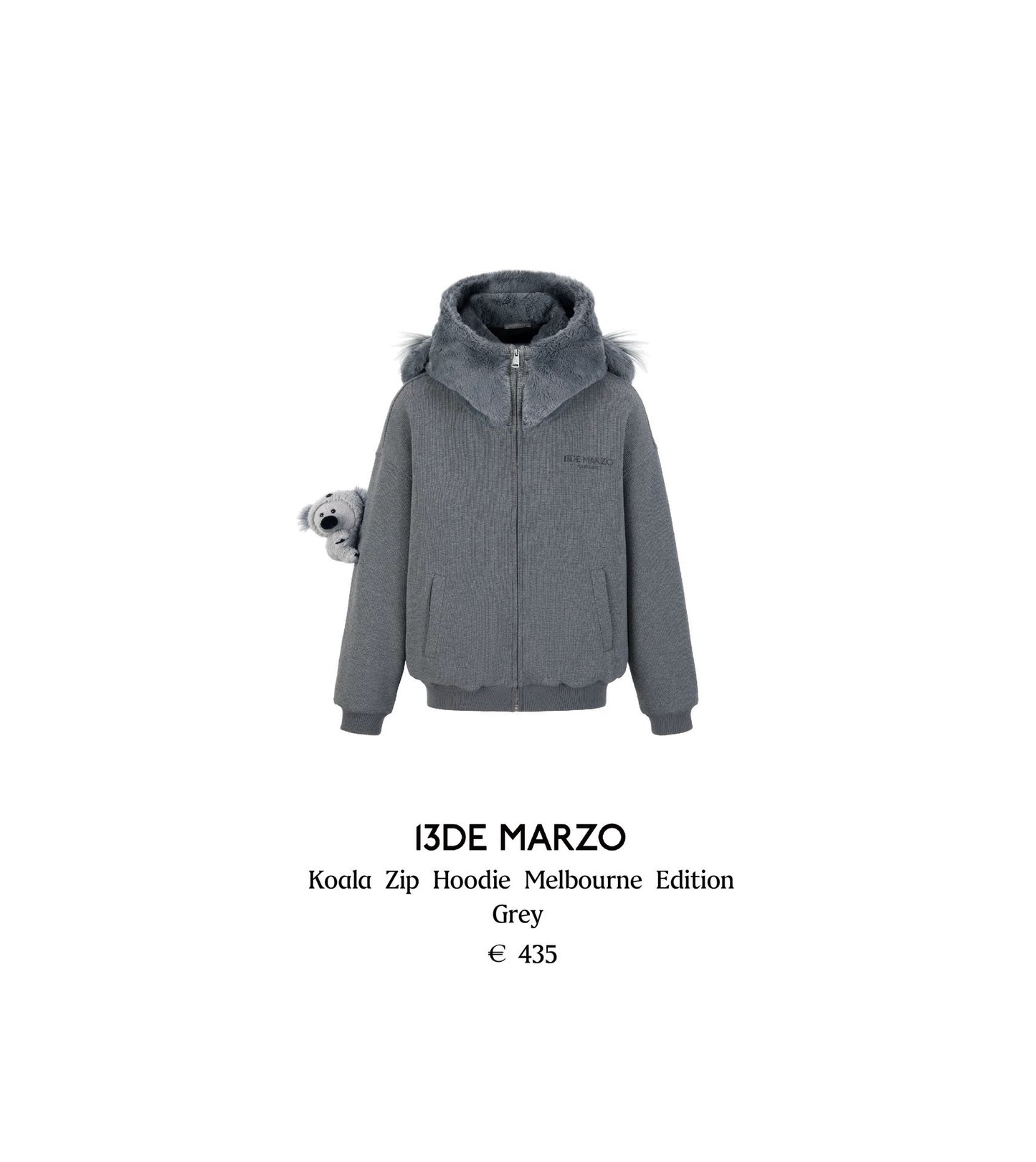Grey zip hoodie with fur hood on a white background, featuring the brand '13DE MARZO'.