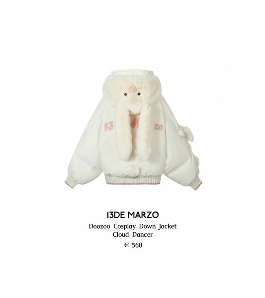 White cosplay down jacket with fur trim on a white background, featuring the brand '13DE MARZO'.